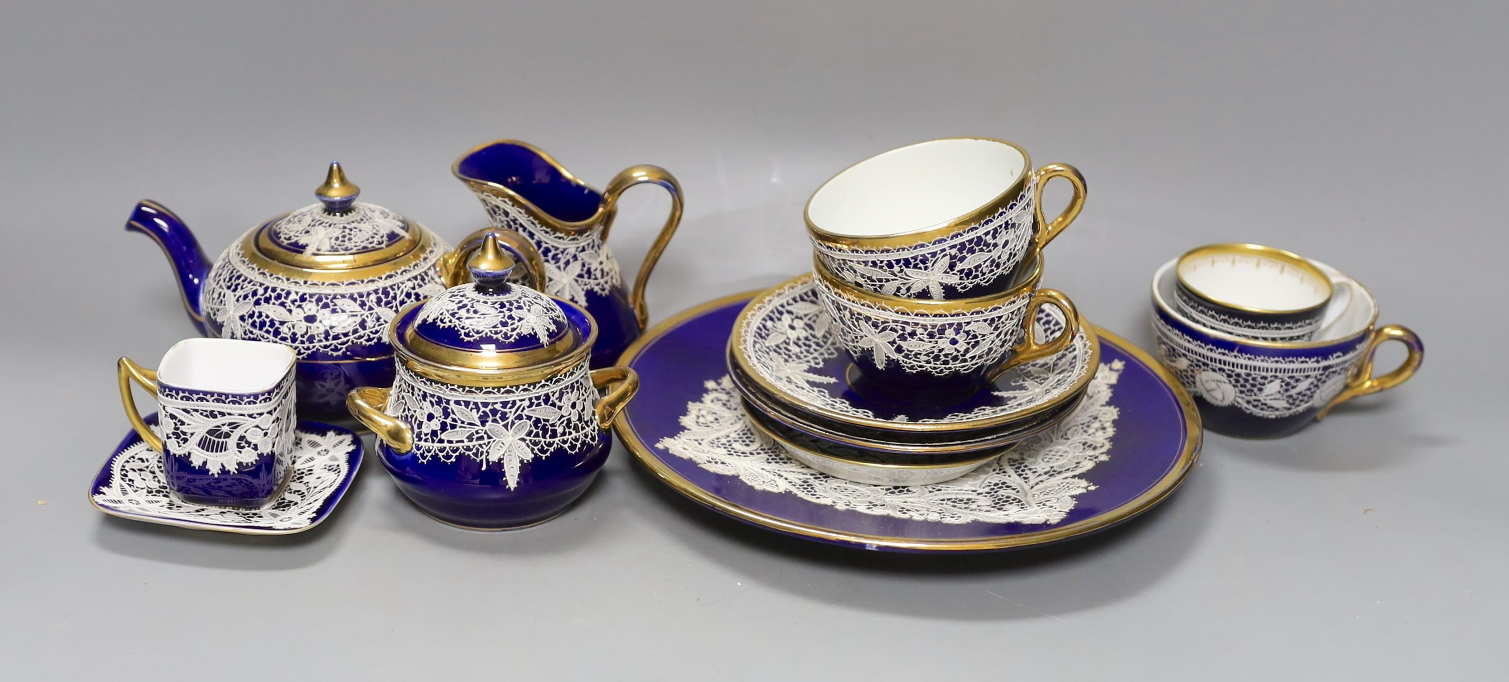 A group of Venetian Lace pattern enamelled blue glazed porcelain teaware (13)